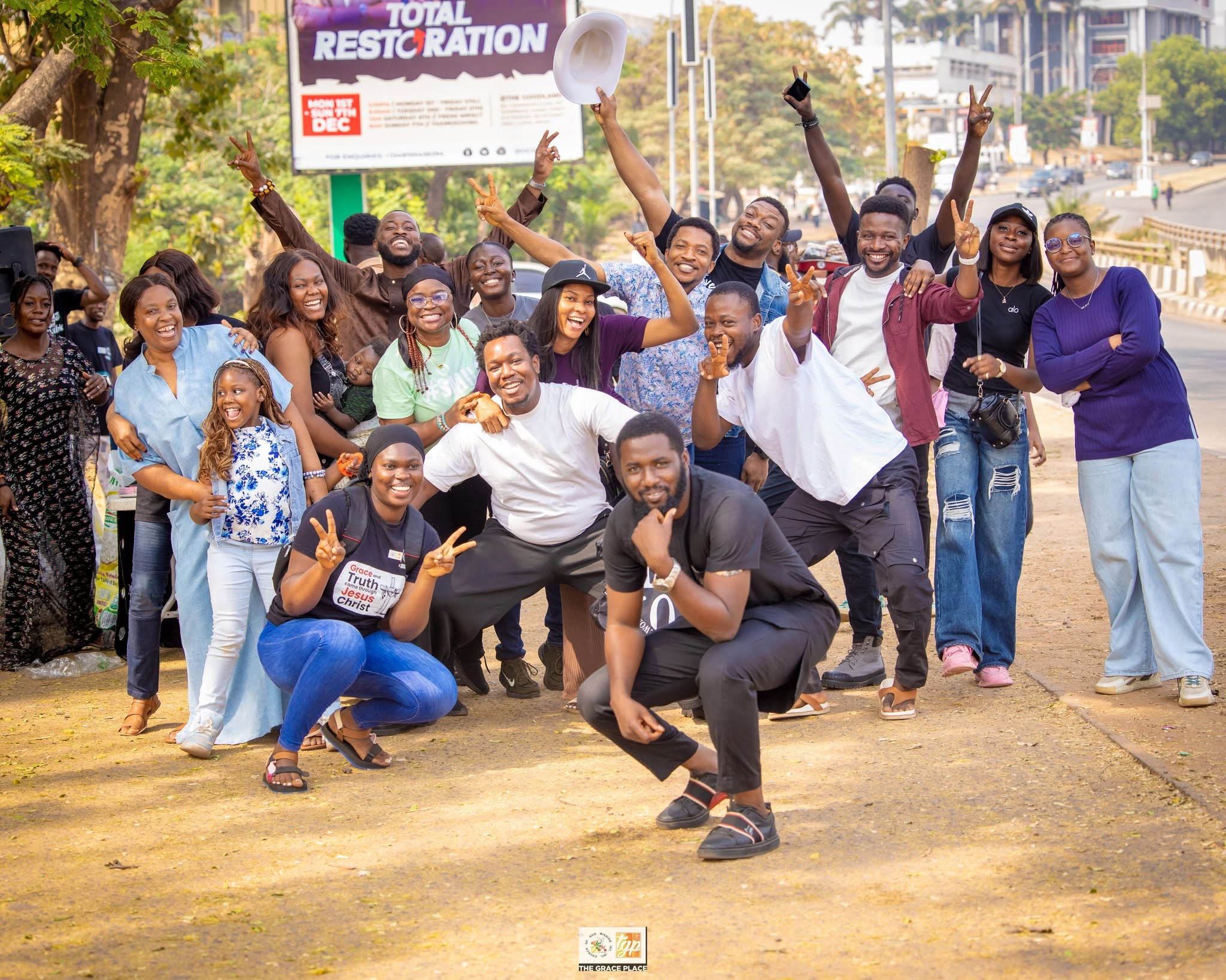 Volunteers gather for a group photo during the outreach.
